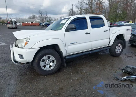 2015 Toyota Tacoma Base V6 z USA, uszkodzony, nr VIN 3TMLU4ENXFM207224